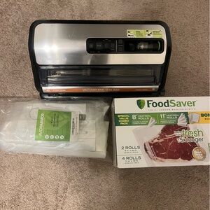 FoodSaver Vacuum Sealer Machine with Vacuum Roll and Bags - Silver & Black